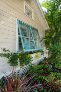 Teal blue Bahama shutters on a Florida home