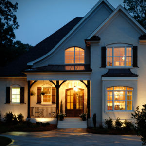 Curbside view of a home with beautiful double-hung windows 