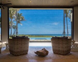Luxury home sitting area looks amazing in front of beach 