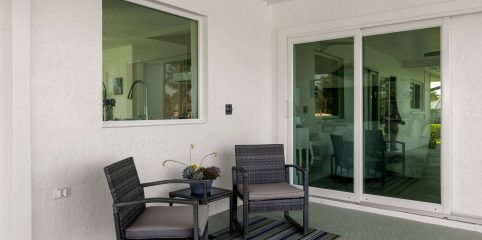 Storm Smart  Sliding patio door with picture window